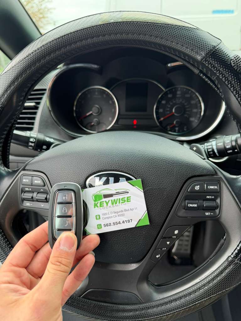 Keywise Locksmith Kia smart key replacement completed at the steering wheel in Orange County, CA