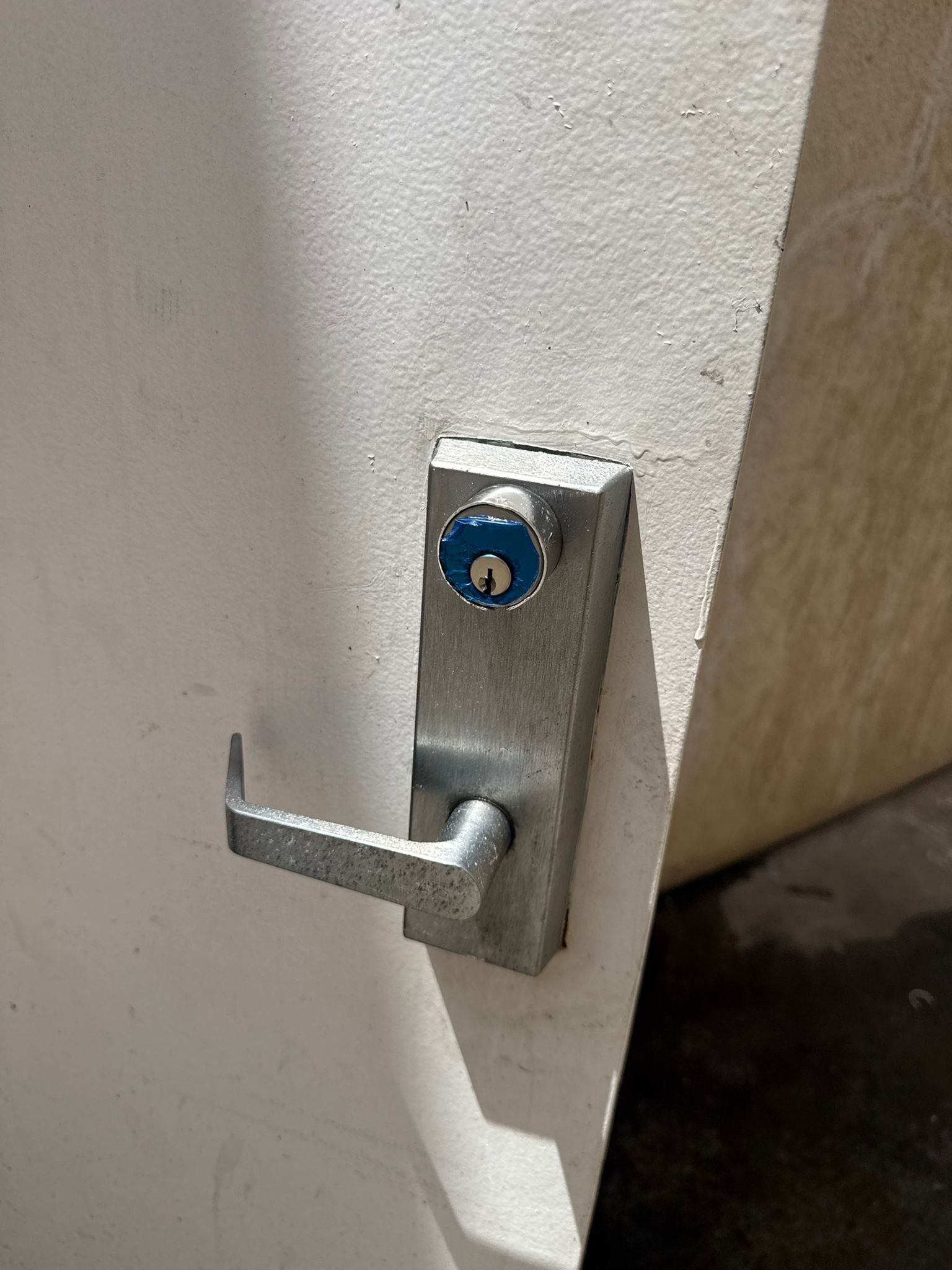 Keywise Locksmith commercial exit panic bar device installed on a storefront door in Orange County, CA
