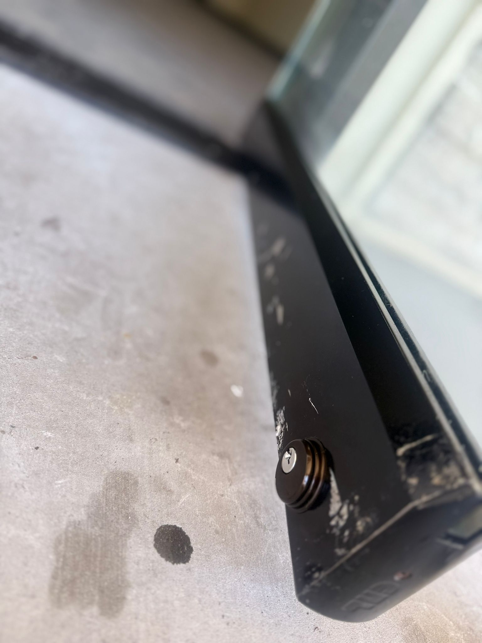 Keywise Locksmith glass storefront door lock cylinder rekeyed in Orange County, CA