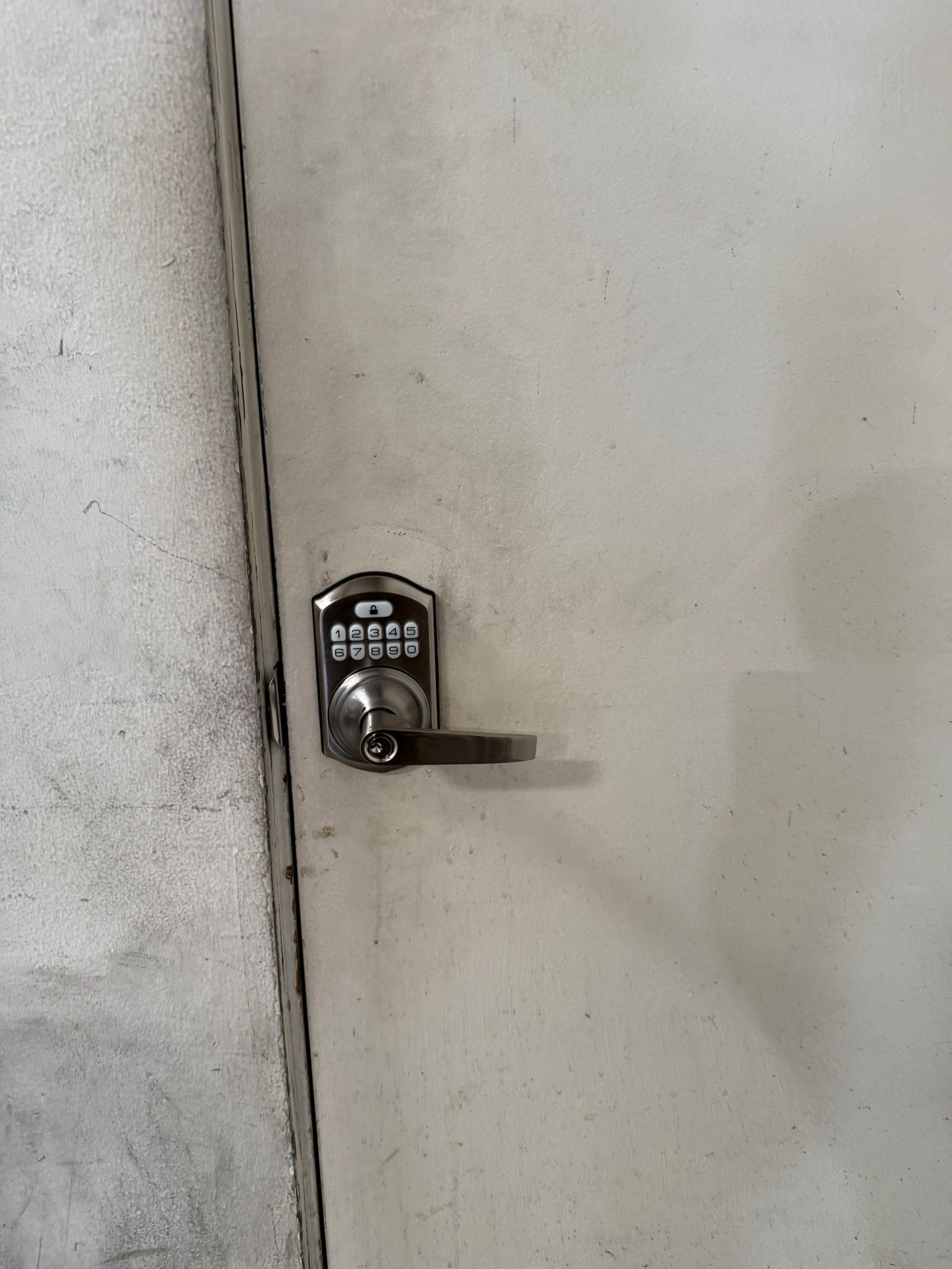 Keywise Locksmith keypad lever lock installed on a commercial steel door in Orange County, CA