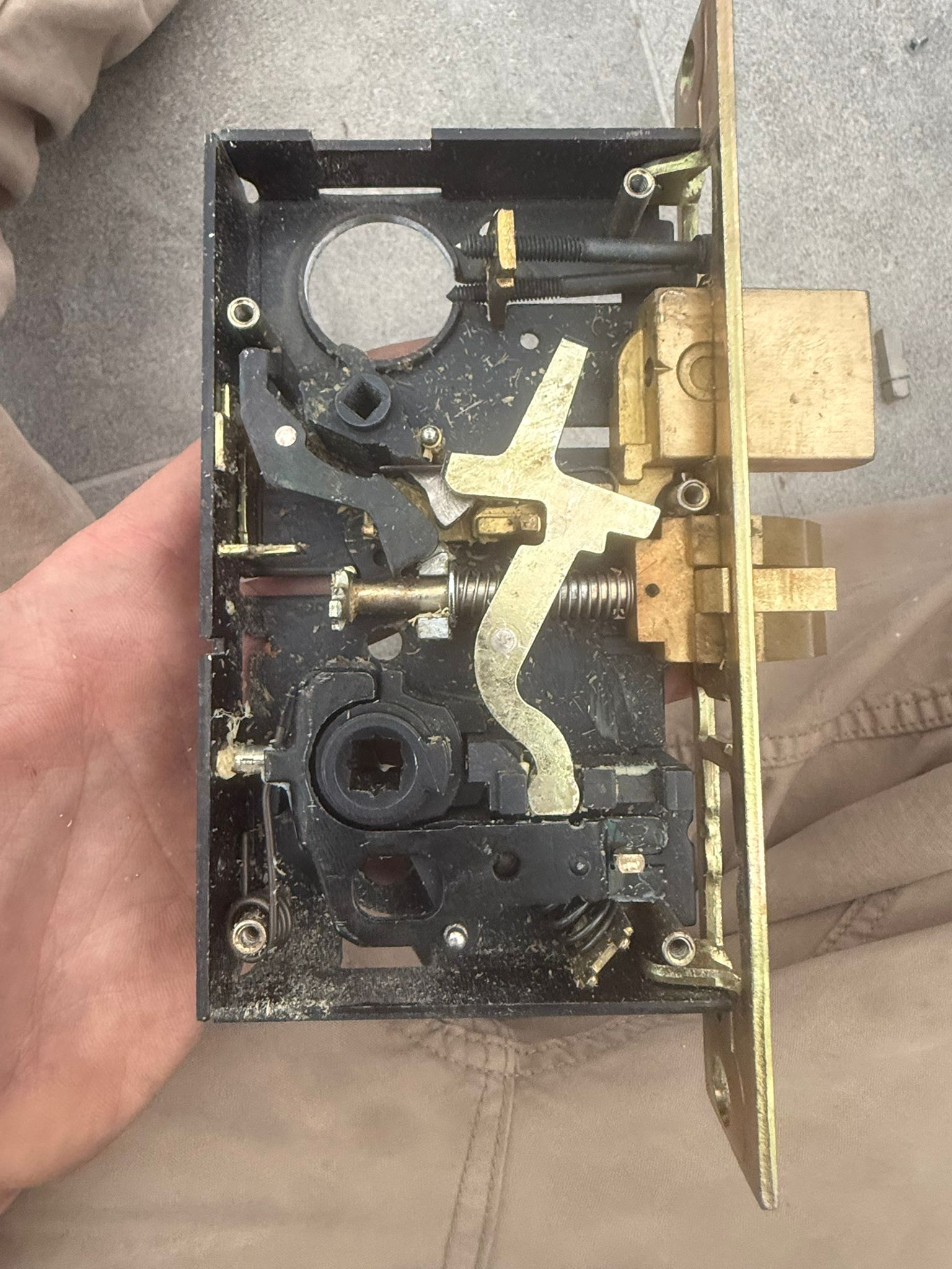 Keywise Locksmith disassembled mortise lock body inspected during repair in Orange County, CA